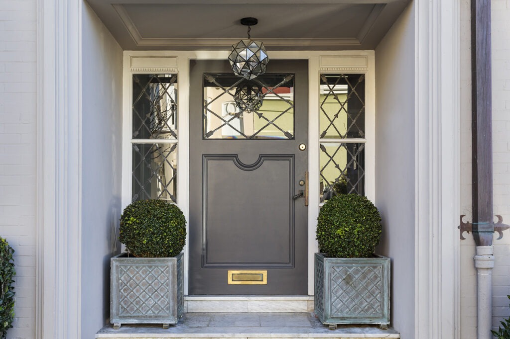 Front door with a grand entryway